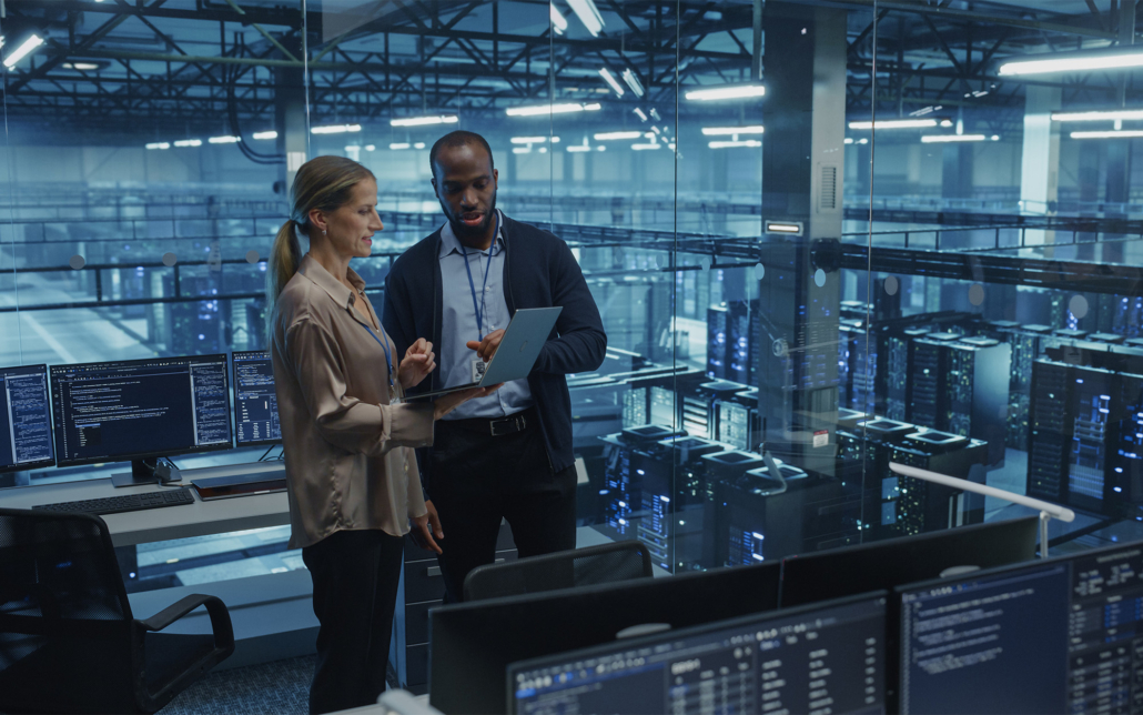 two workers in data center