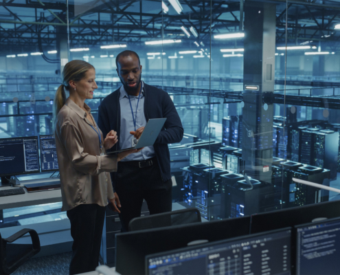 two workers in data center